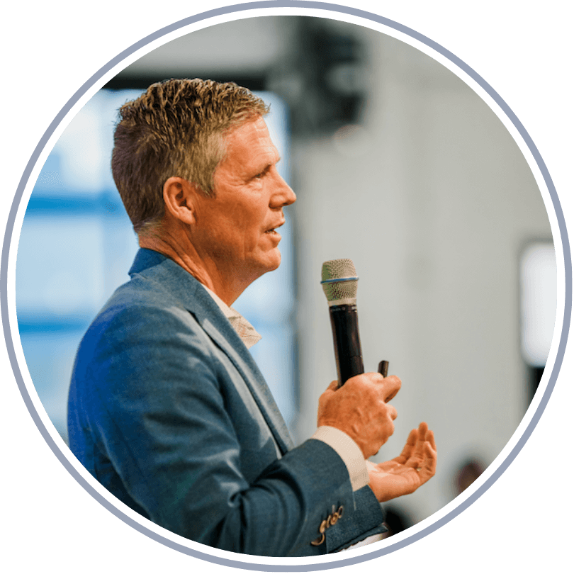 Greg Parham speaking at a real estate event